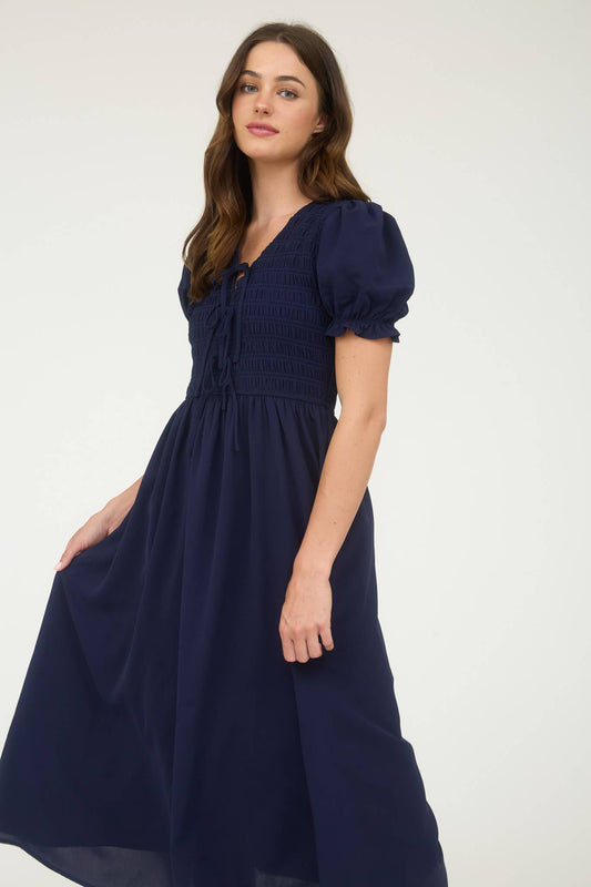 V NECK FRONT TIE SMOCKED PUFF SLEEVE MIDI DRESS: NAVY